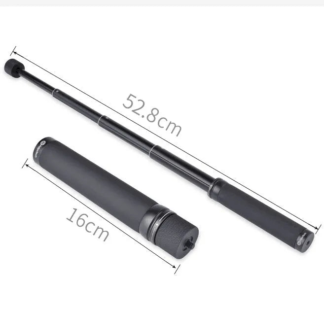 Black retractable selfie stick extended fully with phone attached, showing stabiliser grip.