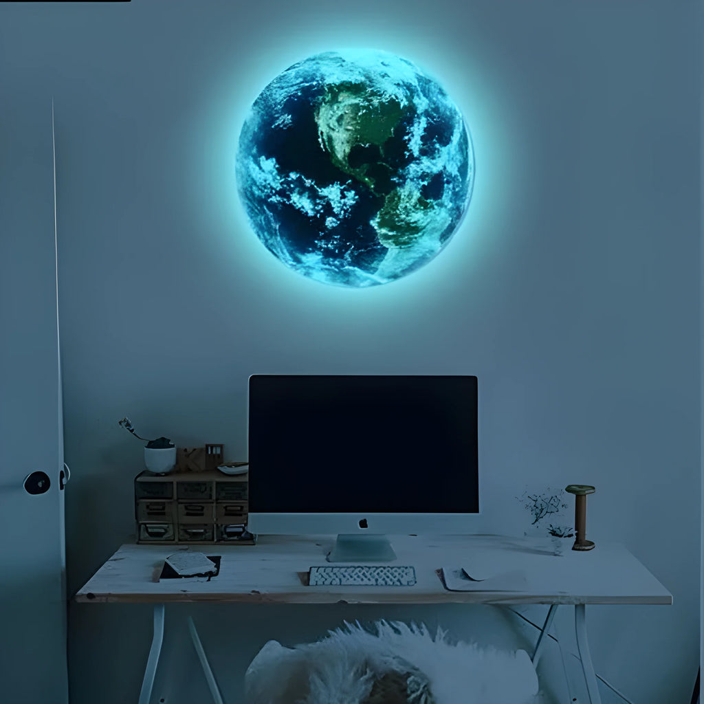 Glow in the dark 3D planet Earth wall sticker on a dark background.