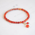 Hand-woven red agate bracelet with ethnic styling and electroplated finish