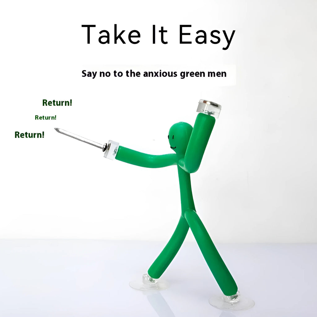 Small plastic decompression toy ornament in green with reject anxiety text, in iron box