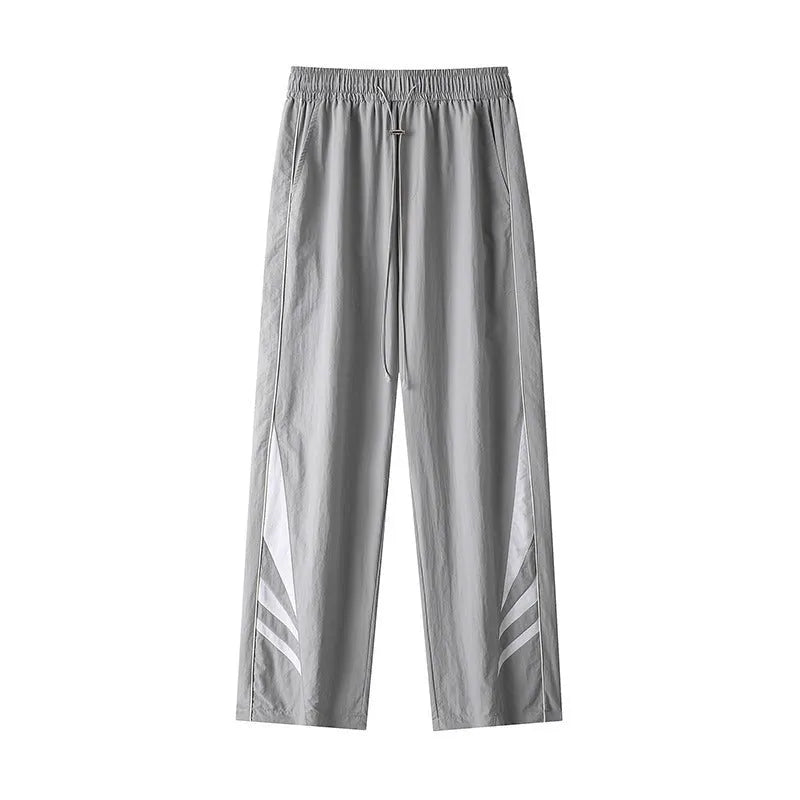 Men's straight-leg cotton blend trousers in black with buttoned cardigan front and non-ironing finish