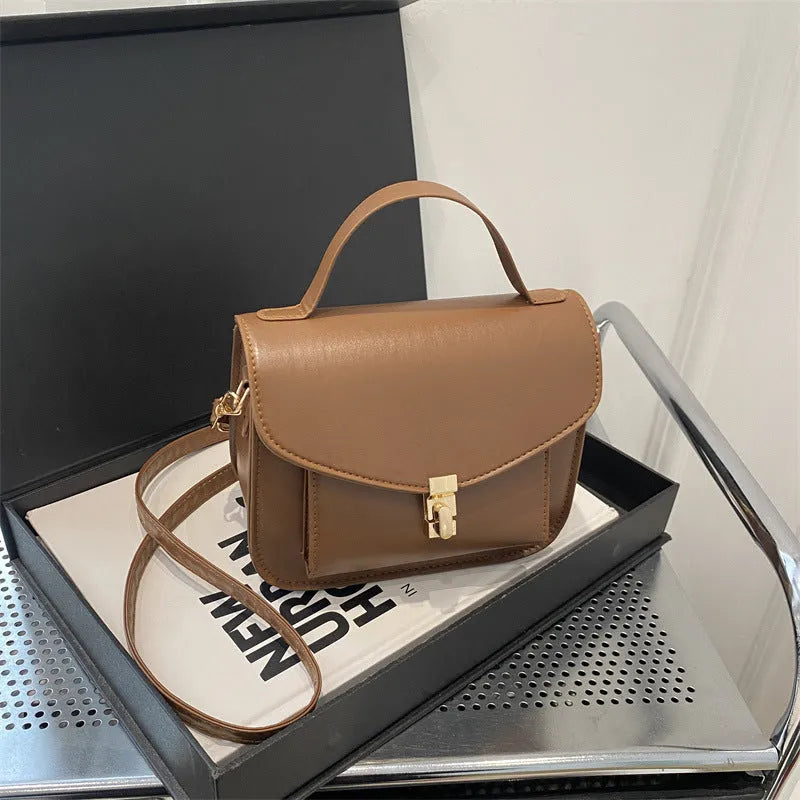 Retro shoulder messenger bag in horizontal square design with document compartment
