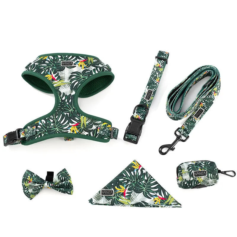 Six-piece cloth dog harness and lead set showing vest, collar, waste bag, bow tie and scarf in assorted colours.