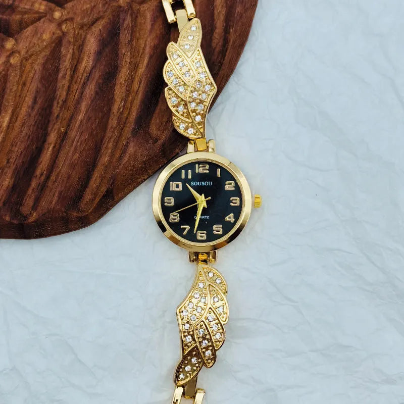 Stainless steel women's watch with round dial and vachette clasp in gold surface colour