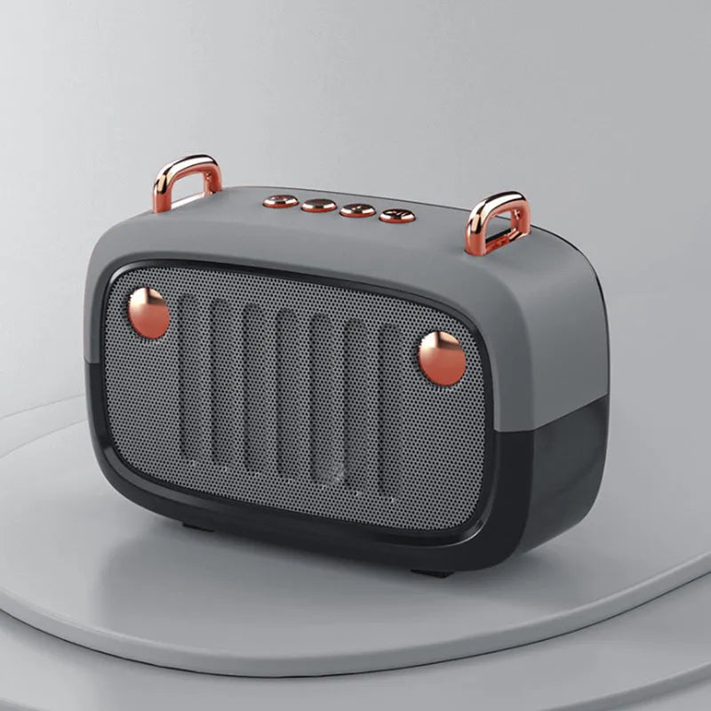 Compact portable Bluetooth subwoofer speaker in black, blue, green, grey or orange with USB port and control buttons