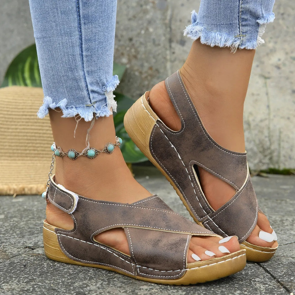 Roman platform sandals with skirt detail, open toe and adjustable Velcro closure in earthy colour