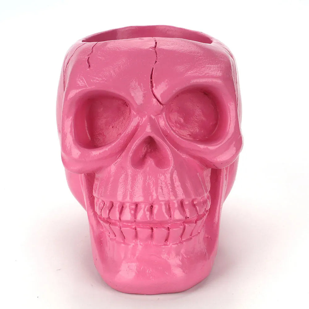 Skull head resin storage tube in black, 11x15x11cm, with brain-shaped interior