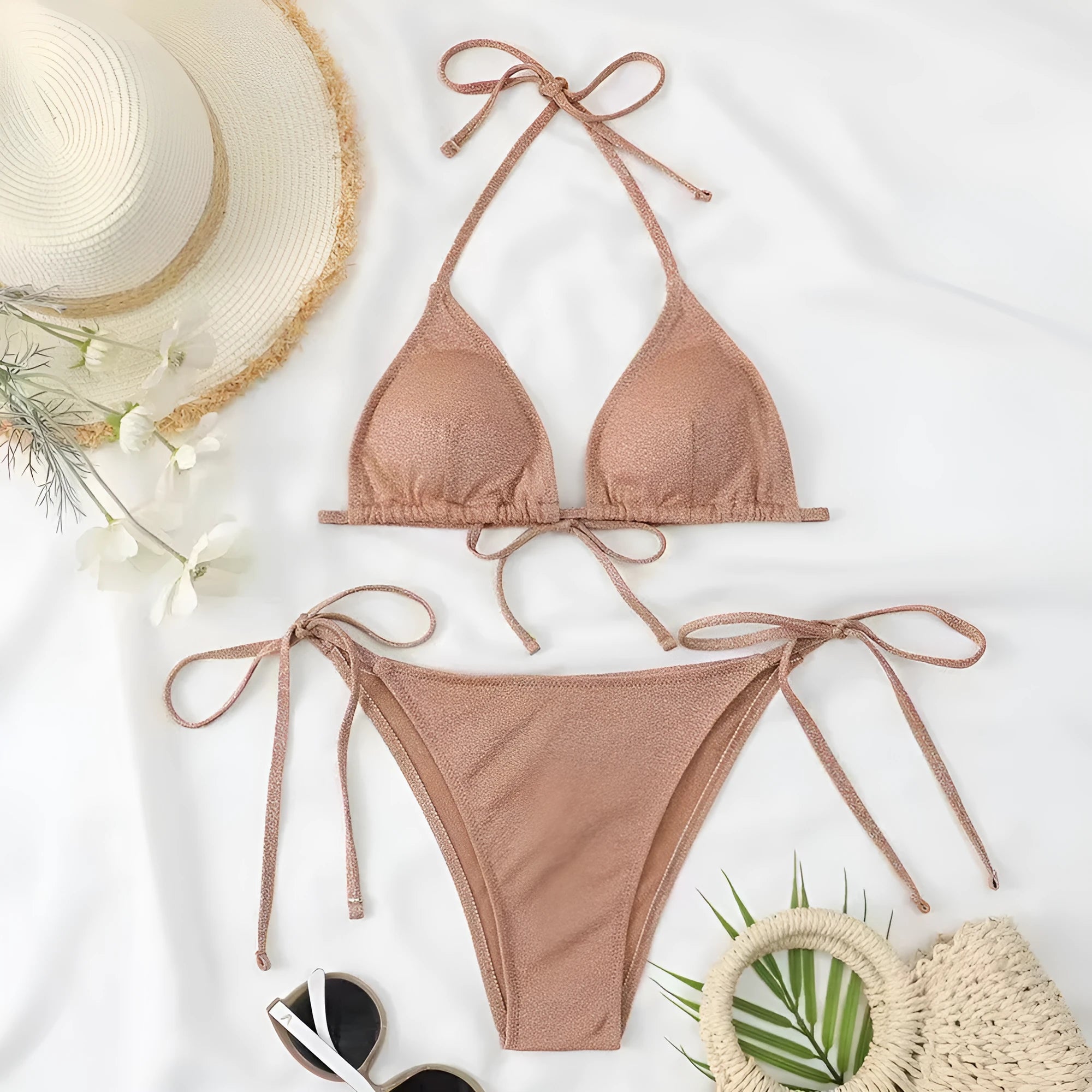 Women's khaki gold bandage bikini swimsuit with split briefs design on a mannequin.