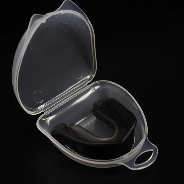 Silicone mouth guard in pink with transparent lockable storage box
