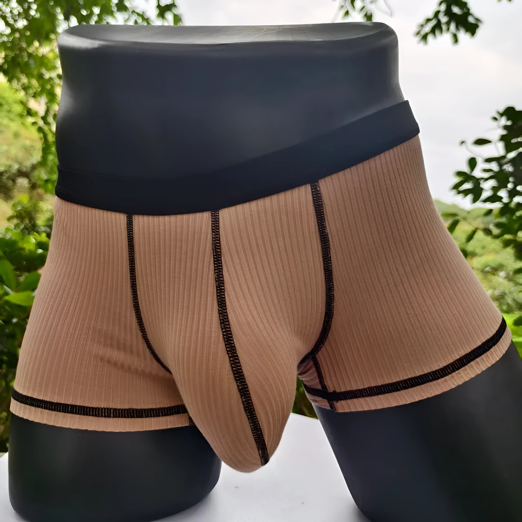 Men's solid colour breathable boxer shorts showing body shaping design in five colour options