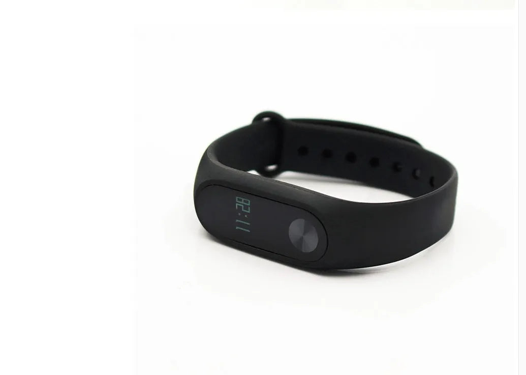 Xiaomi Mi Band 2 black fitness tracker with OLED touchscreen display on wrist