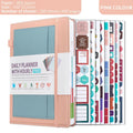 PU leather undated notebook with strap in purple, open to show pages and planning stickers.