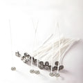 White cotton candle wicks showing three different lengths for DIY candle making projects