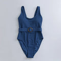 Navy blue women's one-piece swimsuit with triangle slimming shape and removable chest pads