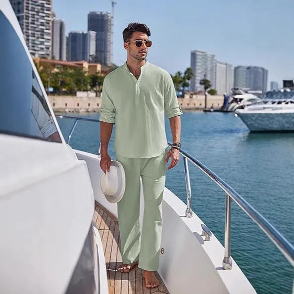 Men's solid colour cotton casual suit with long sleeves and trousers on a hanger