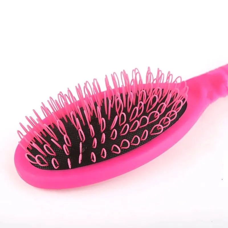 Black and pink ring tooth plastic comb for hair extensions, shown with measurements.