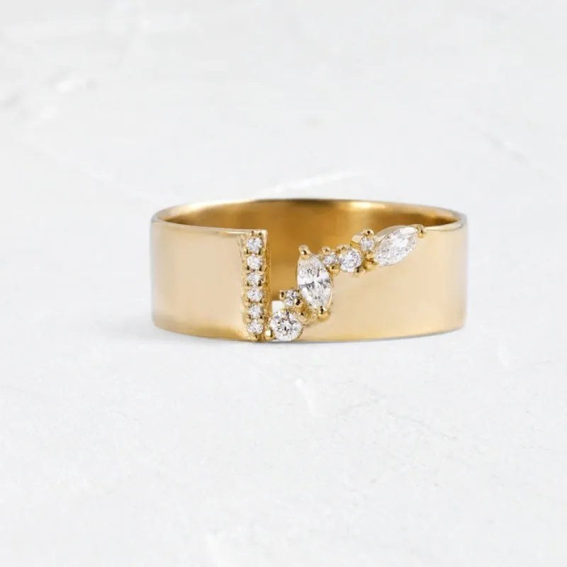 Gold electroplated copper women's fashion ring with shining zircon stones.