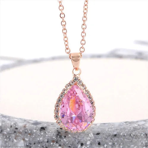 Women's geometric drop shape alloy necklace with rhinestone accents in rose gold pink colour