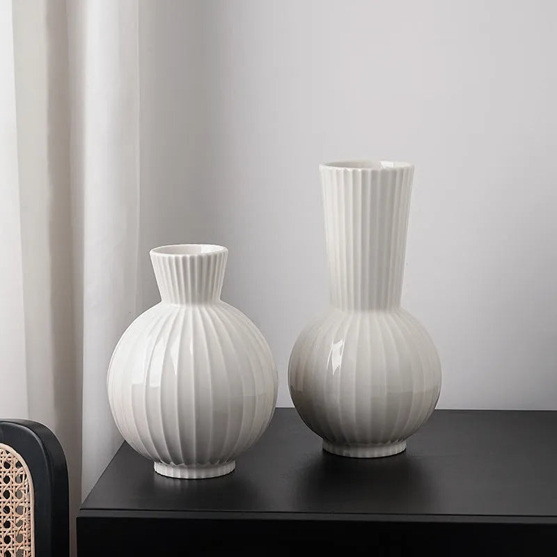 White ceramic ball vase with vertical stripes in American country style for table decoration