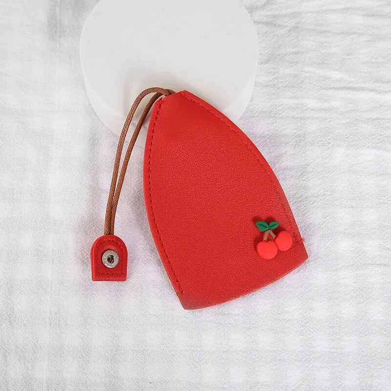 Cartoon pull-out car key case in PU leather with various design options including cactus, rabbit, and fruit themes