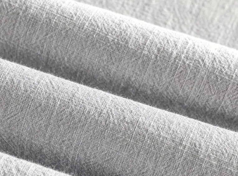 Men's loose-fit cotton linen casual shirt in a solid colour, shown on a hanger.