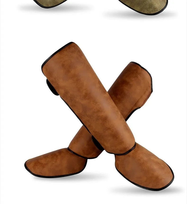 PU vertical thickened fighting boxing shin guards in brown colour on training mat