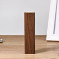 Solid walnut wood portable power bank with 2000mAh battery showing dimensions of 100mm x 25mm x 25mm