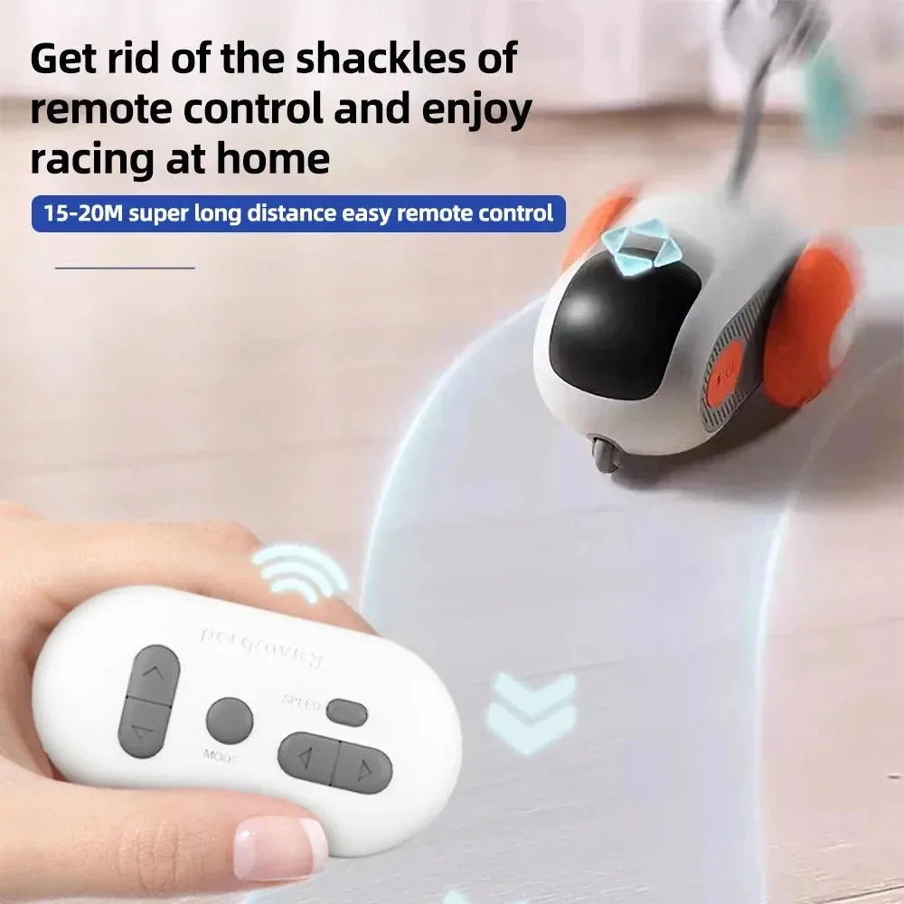 Blue interactive cat toy car with feather attachment and remote control on wooden floor