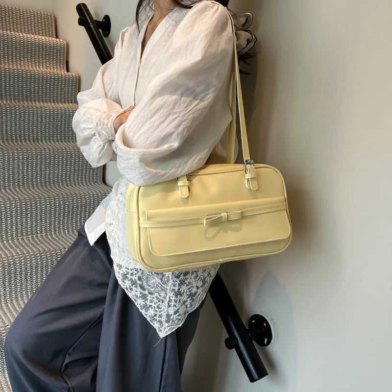 Women's PU leather single shoulder bag in horizontal square shape with flap closure and double straps