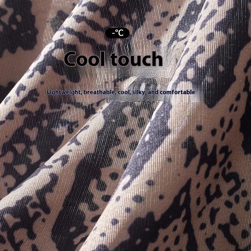 Men's thin loose polyester boxer shorts in black on grey background showing mid-waist design