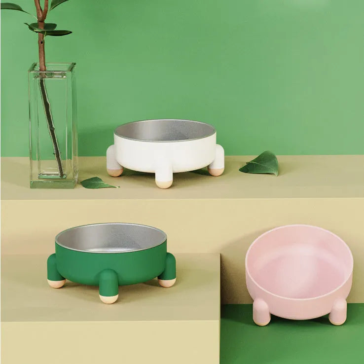Stainless steel pet bowl with non-slip base and high foot in green, pink, and white colour options