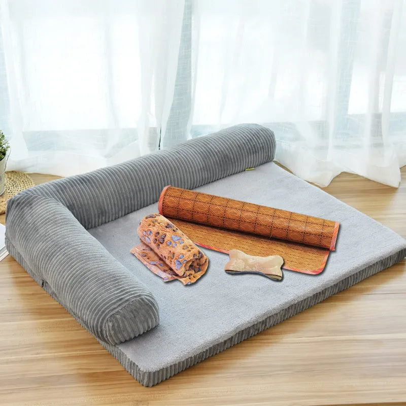 Corduroy pet dog bed sofa with removable cover in a grey colour, shown in a living room setting.