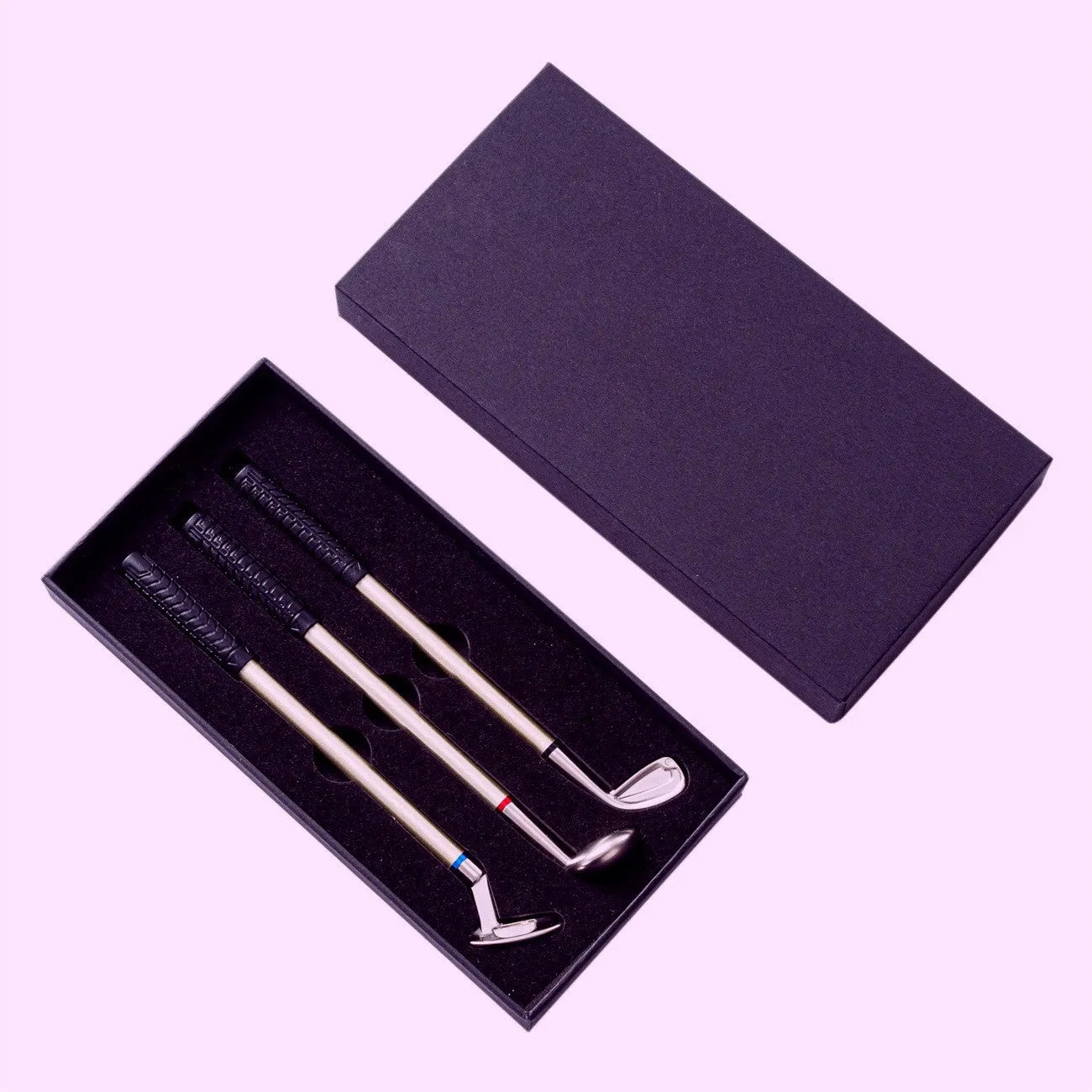 Three metal ballpoint pens with suit pattern design showing 0.7mm writing tips