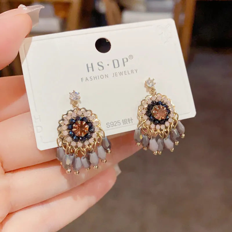 Blue diamond round crystal tassel earrings with thick gold plating and geometric design on copper base