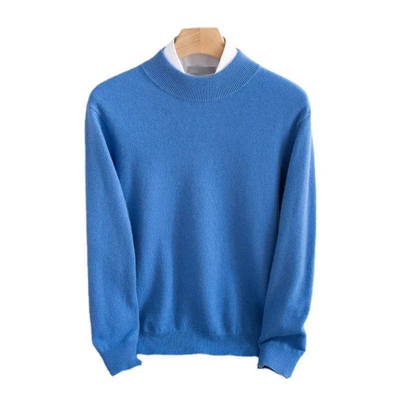 Man wearing a loose-fit half-collar wool sweater in a winter setting.