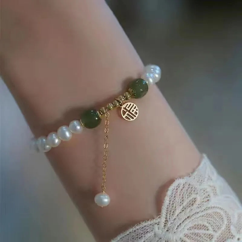 Chinese style glass bamboo leaf bracelet for women with manual craft details.