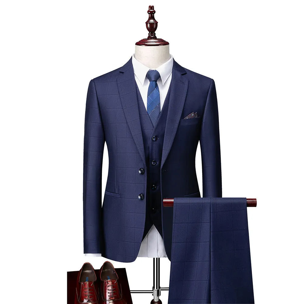 Men's navy blue plaid slim fit three-piece suit with vest, jacket, and trousers for business casual wear