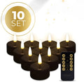 Four black S10 LED flameless tealight candles showing flickering flame effect.