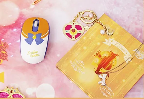 Sailor Moon wireless optical mouse with USB receiver in pink colour featuring anime character designs