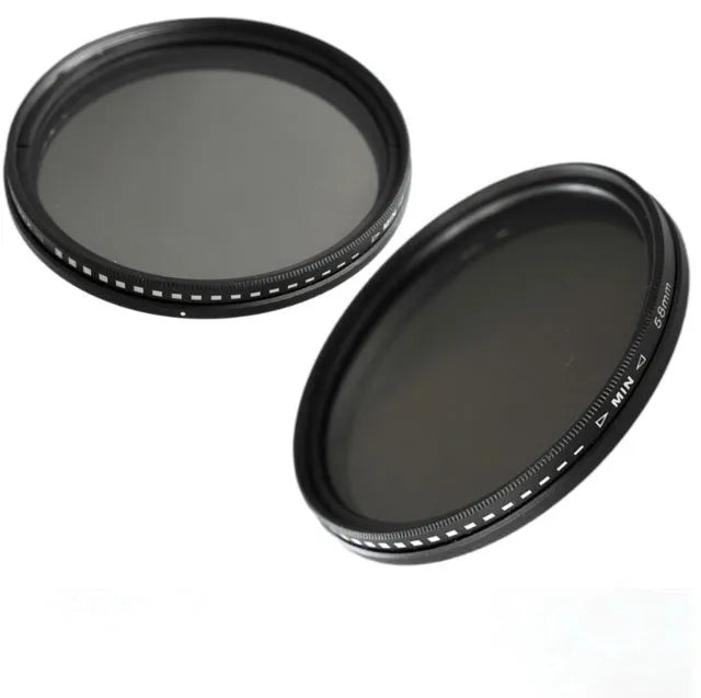 Set of circular camera lens filters in multiple sizes including ND-2, ND-4, ND-8, and ND-400 neutral density filters.