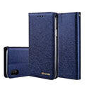 Black PU leather flip phone case for Apple iPhone with card slots open.