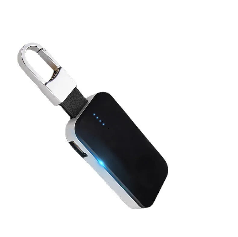 Black portable Apple Watch wireless charger with keychain loop and built-in battery