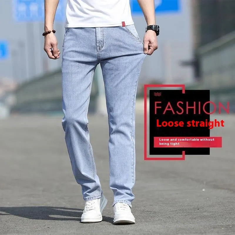 Men's smoky grey straight leg jeans with low waist design and zipper fly closure