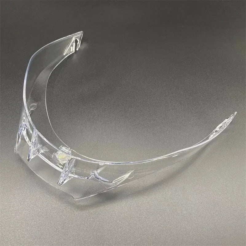 PISTA helmet tail spoiler in clear polycarbonate with three colour-matched screws visible against dark background