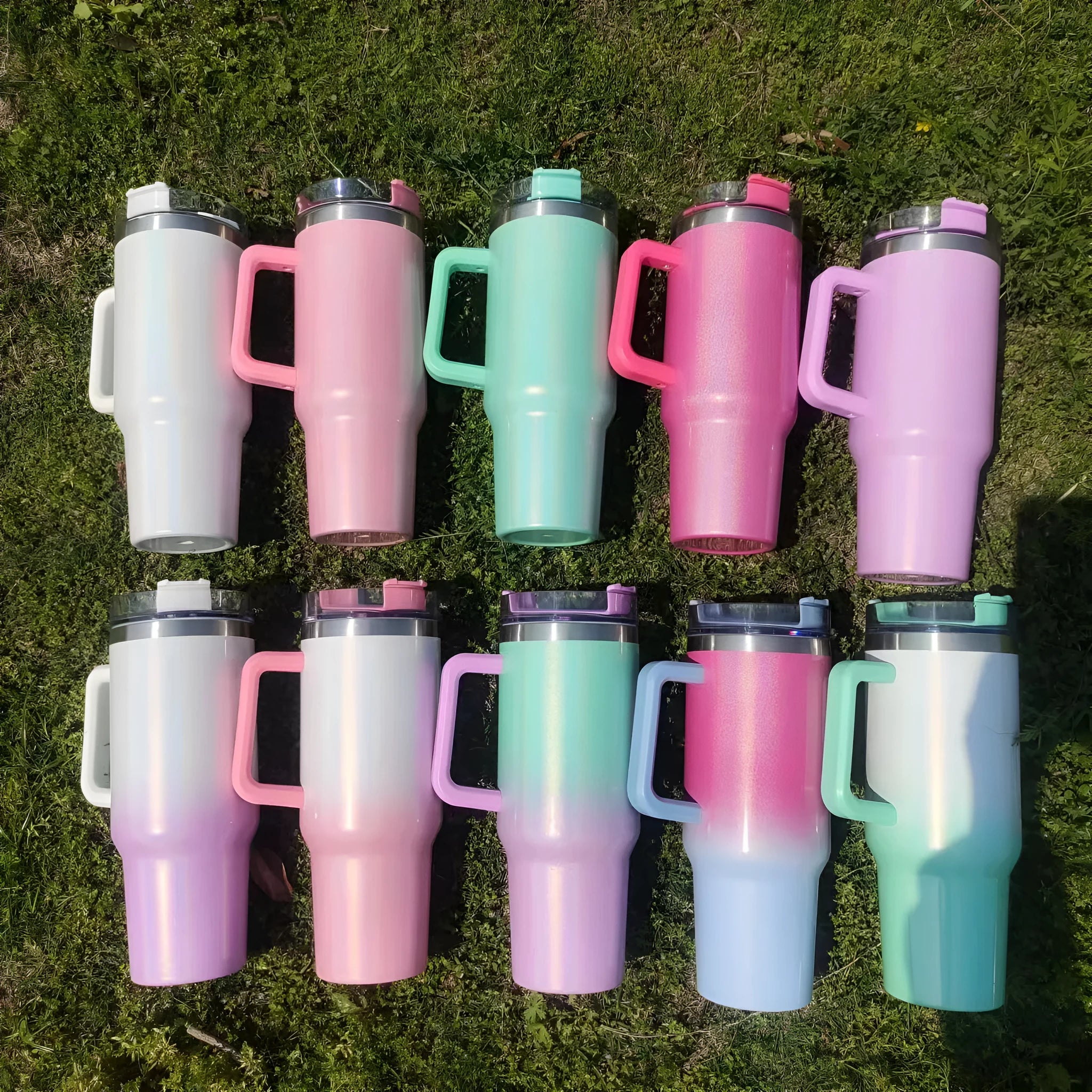 Large stainless steel vacuum insulation cup in a rainbow or gradient colour finish.