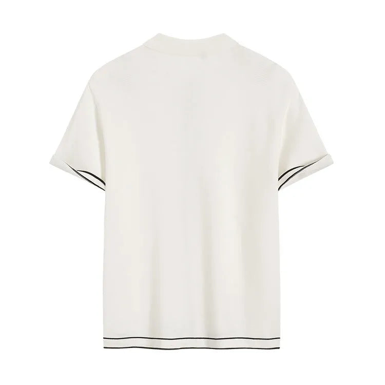 White short sleeve cardigan with contrast colour lapels on a hanger.
