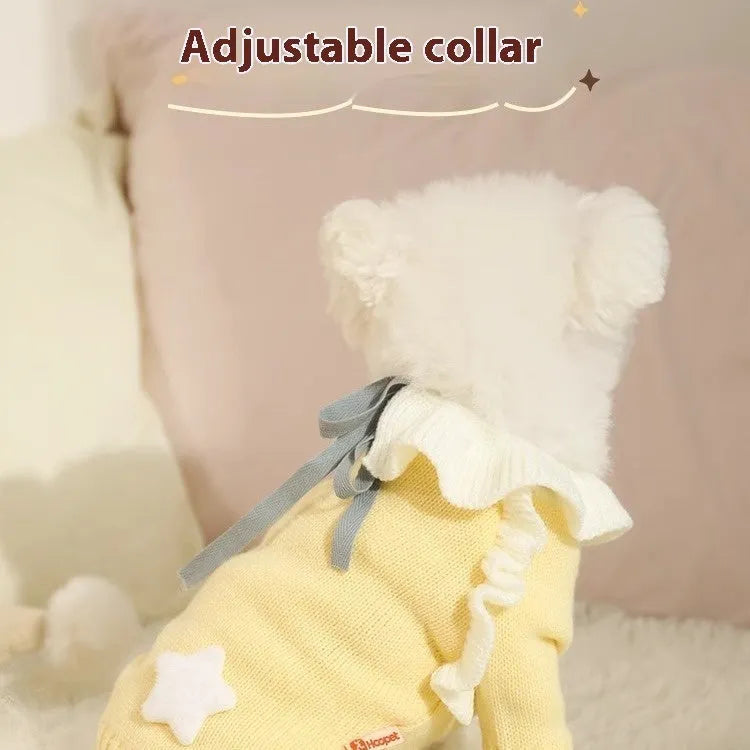 Yellow acrylic dog sweater for a small puppy on an autumn day