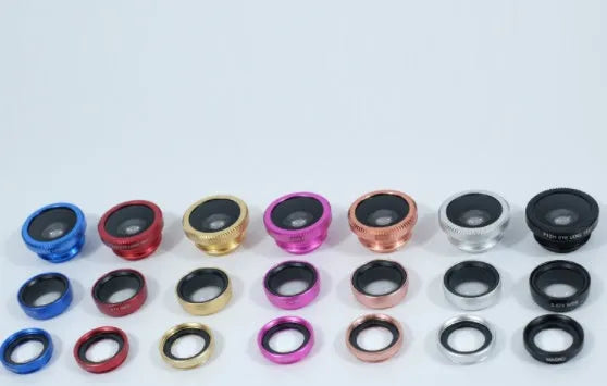 Smartphone external camera lens kit showing wide-angle, macro, and fisheye lenses in metal housing.