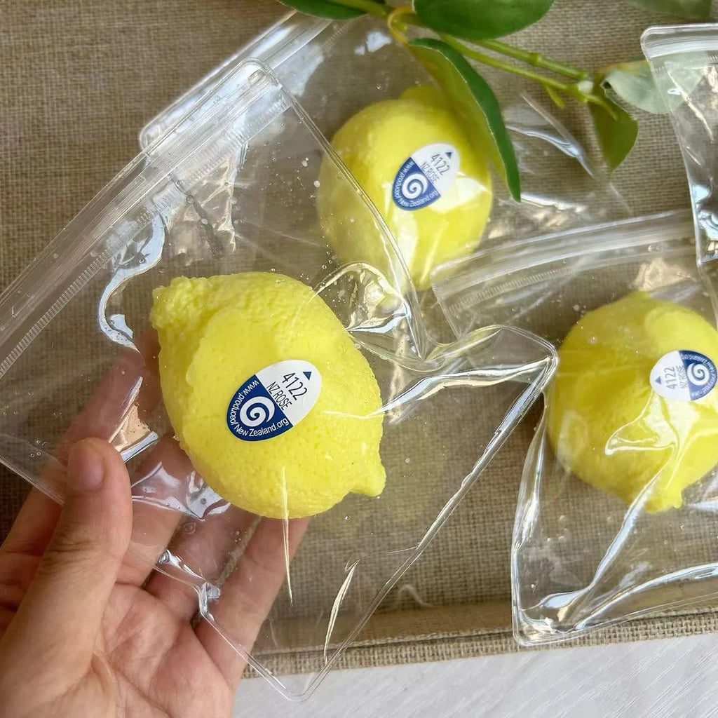 Silicone lemon squeezing toy in silicone lemon colour for pressure reduction and grasp training