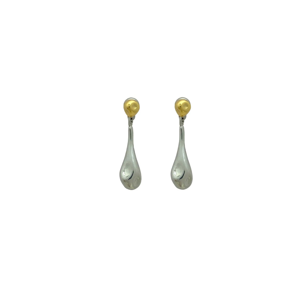 Water drop colour clash copper ear clips with teardrop and geometric shapes on women's ear